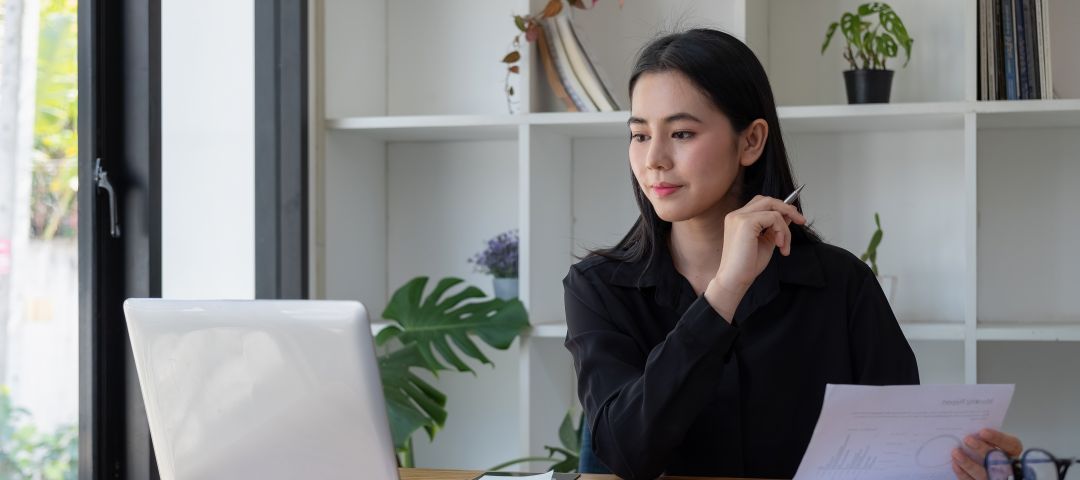 Asian Business Woman at Office Desk