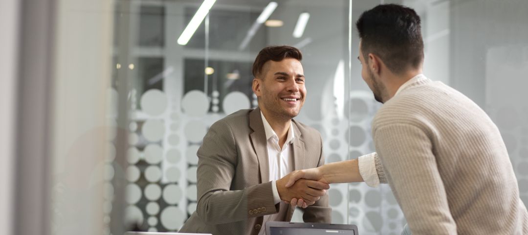 Men Handshake in Office