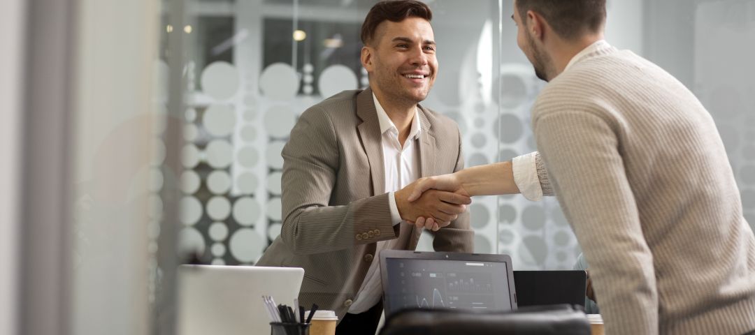 Men Handshake in Office