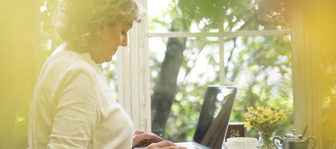 woman working at home but outside