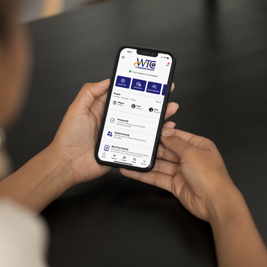 Woman Holding WTC Connect 3 Homescreen on Phone